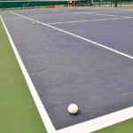 Assurer la Durabilité d’un Revêtement en Béton Poreux lors de la Rénovation d’un Court de Tennis à Garches