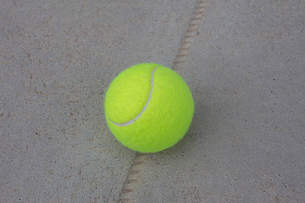 Rénovation terrain de tennis en béton poreux lyon