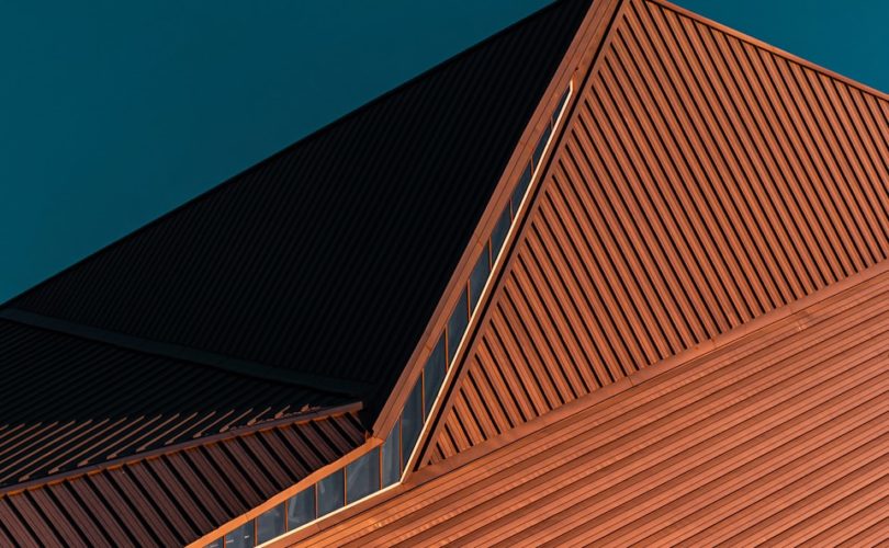 brown concrete building under blue sky during daytime