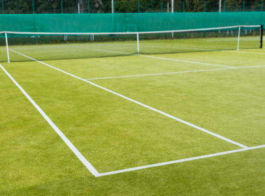 construction court de tennis en gazon synthétique à Poitiers